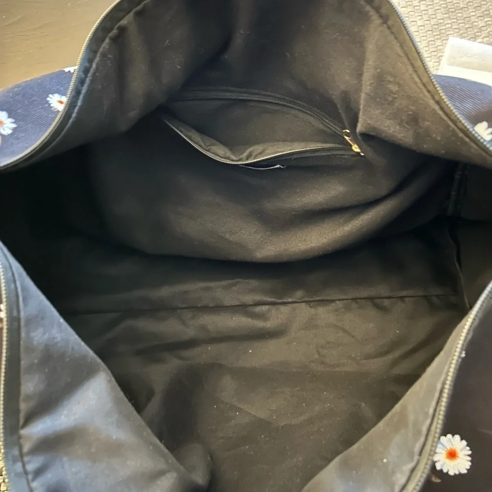Alice & Olivia black floral canvas duffle bag